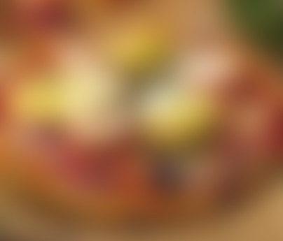 Red onion, artichoke and tomato pizza